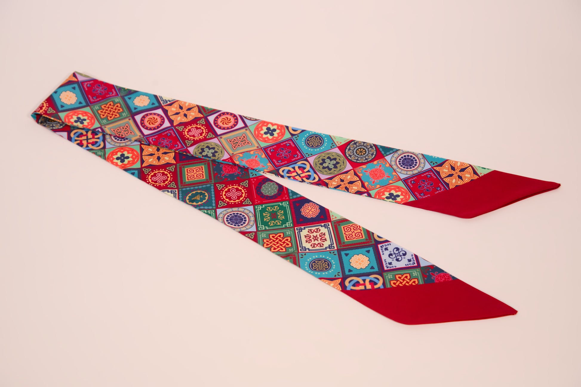 Ornament silk scarf traditional Caucasian pattern red – flat lay view