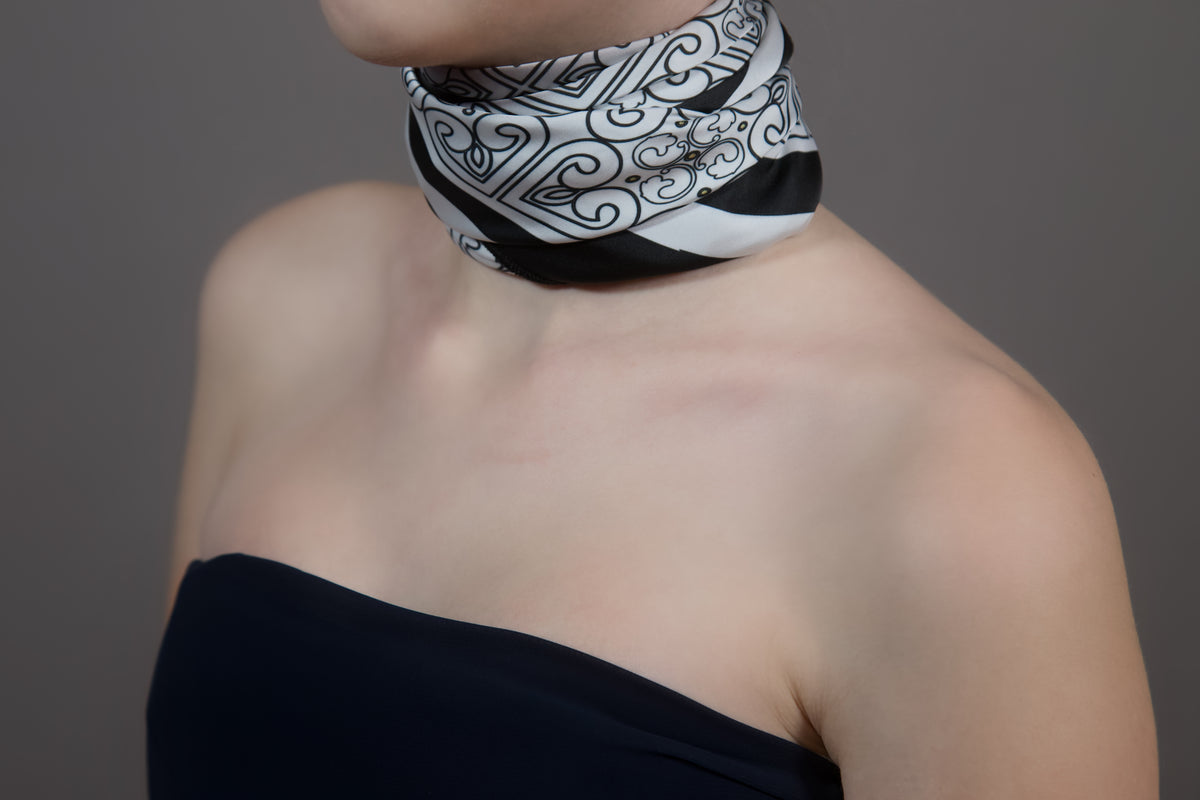 Black white ornament silk scarf – model wearing scarf